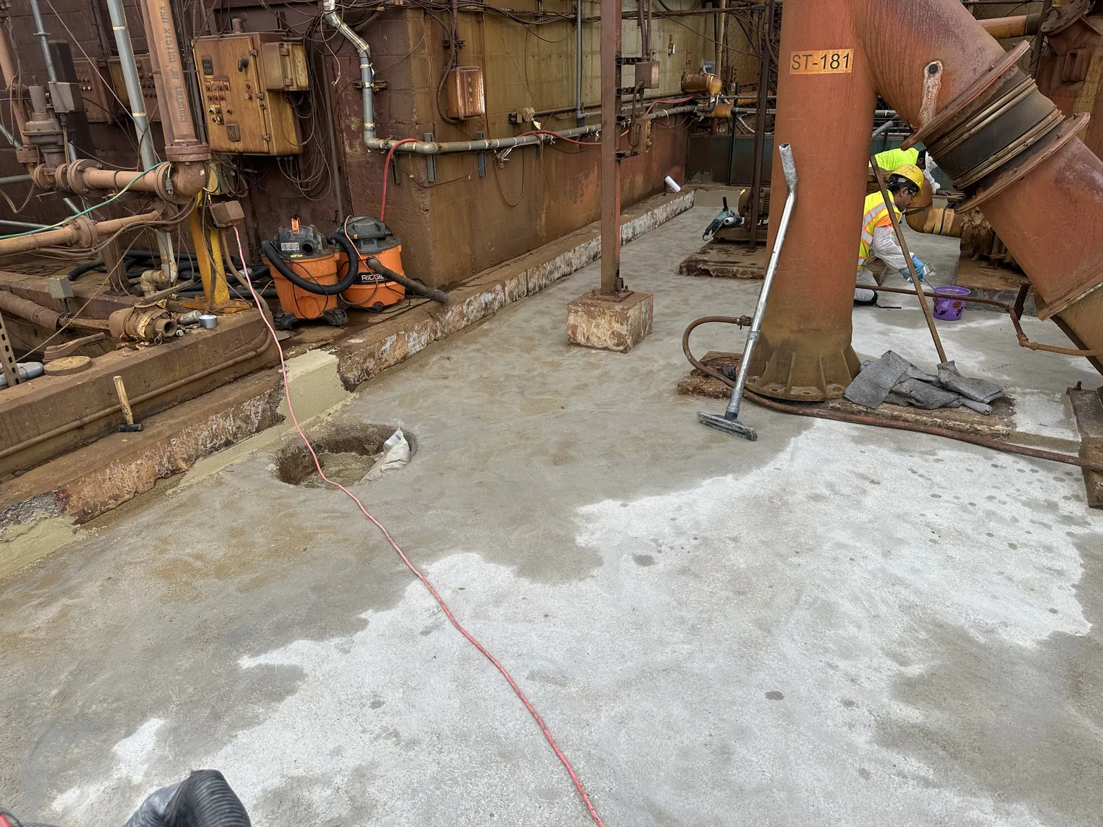 Containment sump prepared to sound concrete before lining